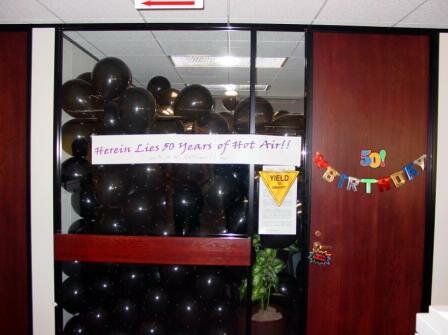 50 Years of Hot Air: We filled the boss's office with a bazillion balloons to celebrate his 50th birthday. He spent most of the morning popping them and cleaning up!